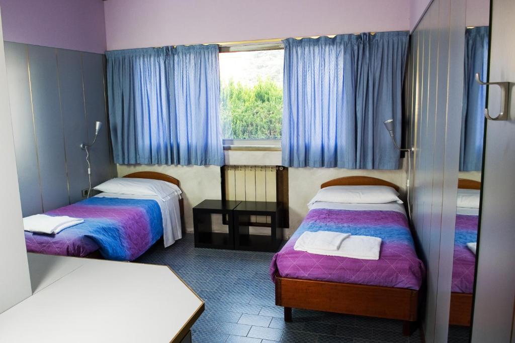 Hotel Maria Luisago Pokoj fotografie